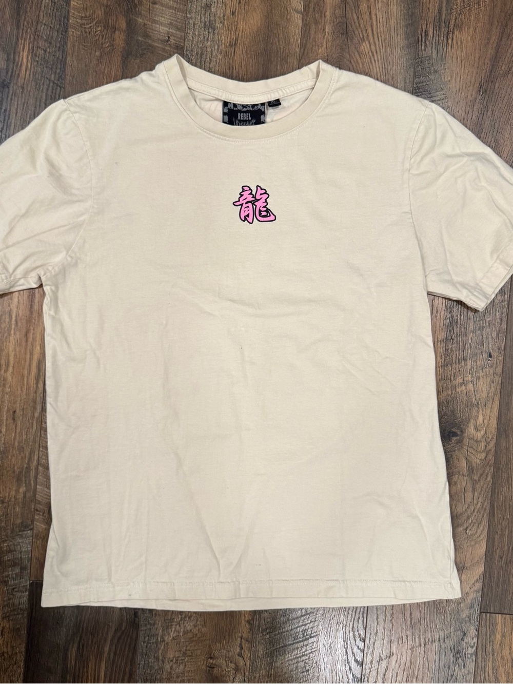 Cream Short Sleeve Tee with Pink Chest Motif and Colorful Graphics on Back Side